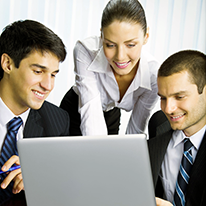 Description: Three happy smiling successful business people working with laptop at office Stock Photo - 12234699